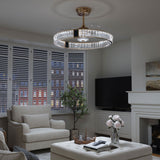 Gold crystal ceiling fan with LED light in a modern living room setting