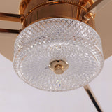 Gold ceiling fan light with crystal shade and compact flush ceiling design