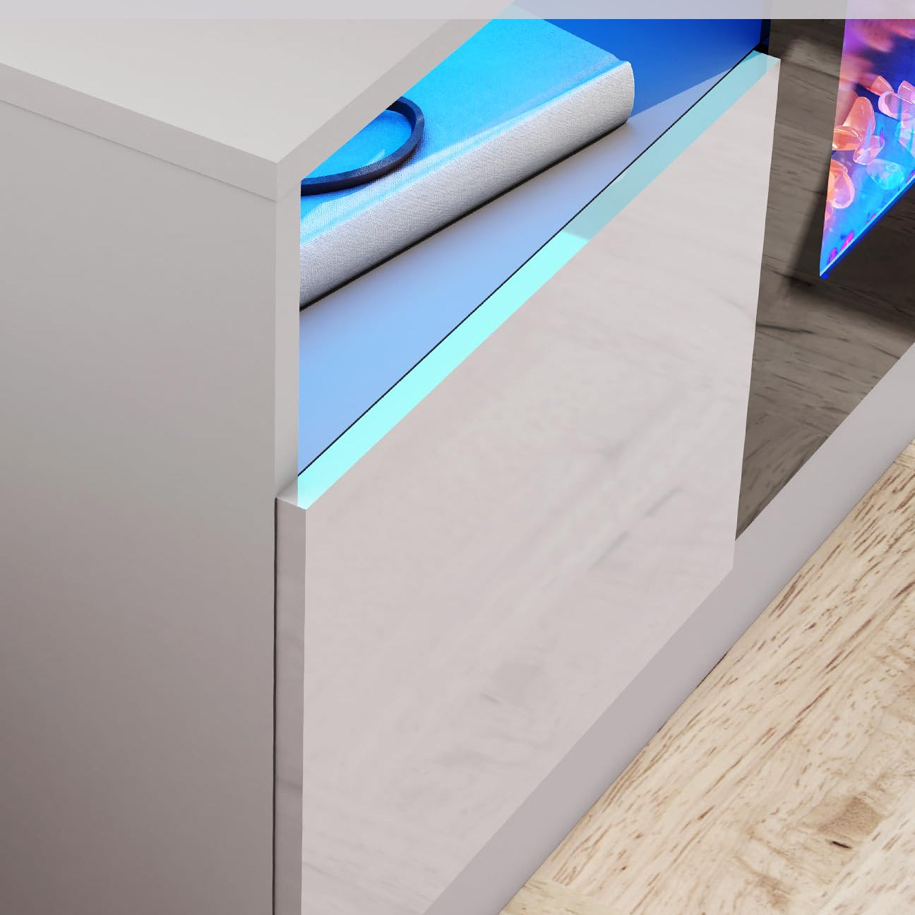 detail of white electric fireplace with storage cabinets