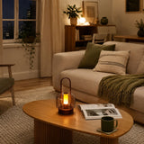 portable lantern-style ambient table lamp styled on a small side table
