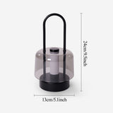 portable lantern-style ambient table lamp with a warm diffused glow