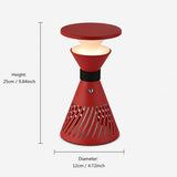 retro funnel cordless table lamp styled on a small side table