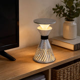 retro funnel cordless table lamp beside books and evening decor