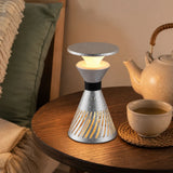 retro funnel cordless table lamp styled on a small side table