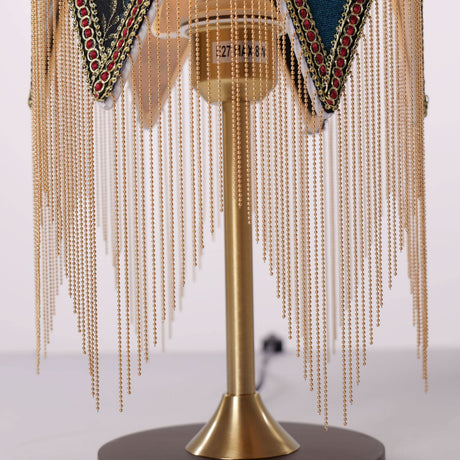 mid-century tassel table lamp with close-up shade and base details