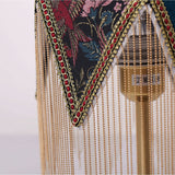 mid-century tassel table lamp shown as a clean product view