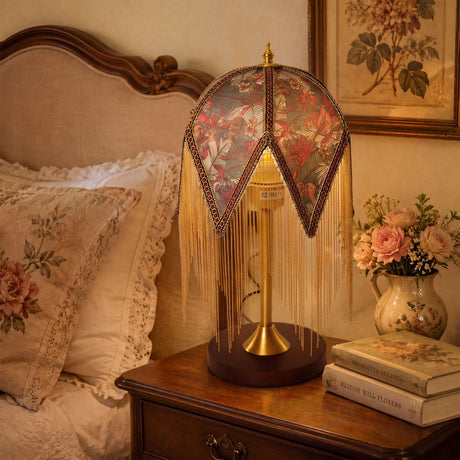 mid-century tassel table lamp adding warm light to a bedroom